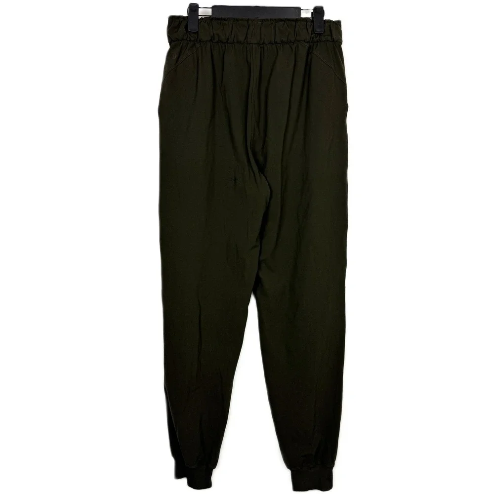 Lululemon On The Fly Jogger Dark‎ Olive Green Elastic Waist Size 8 FLAWED